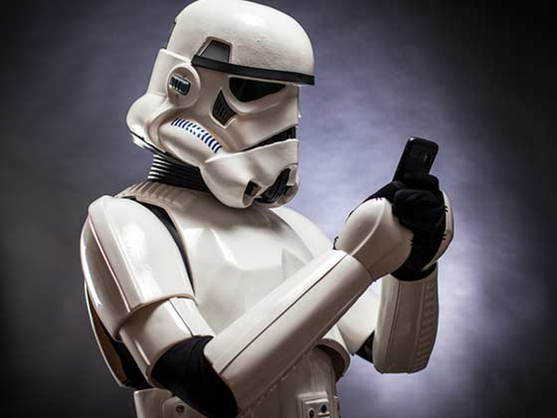 Stormtrooper holding a cell phone